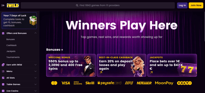 iWild Casino startsida som visar menyn, antal spel samt knappar för registrering och inlogg.